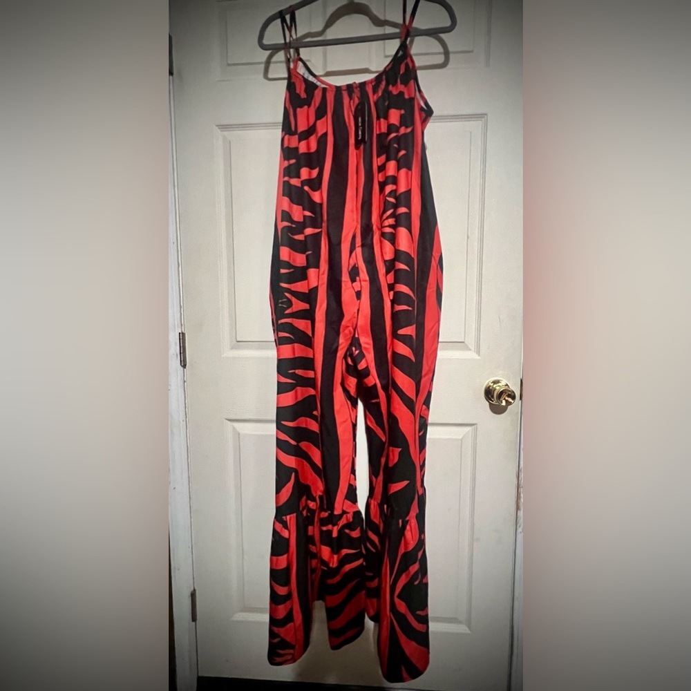 Beautiful one size fits all wide leg romper with pockets